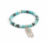 Bracelet de lithothérapie en pierre précieuse turquoise.